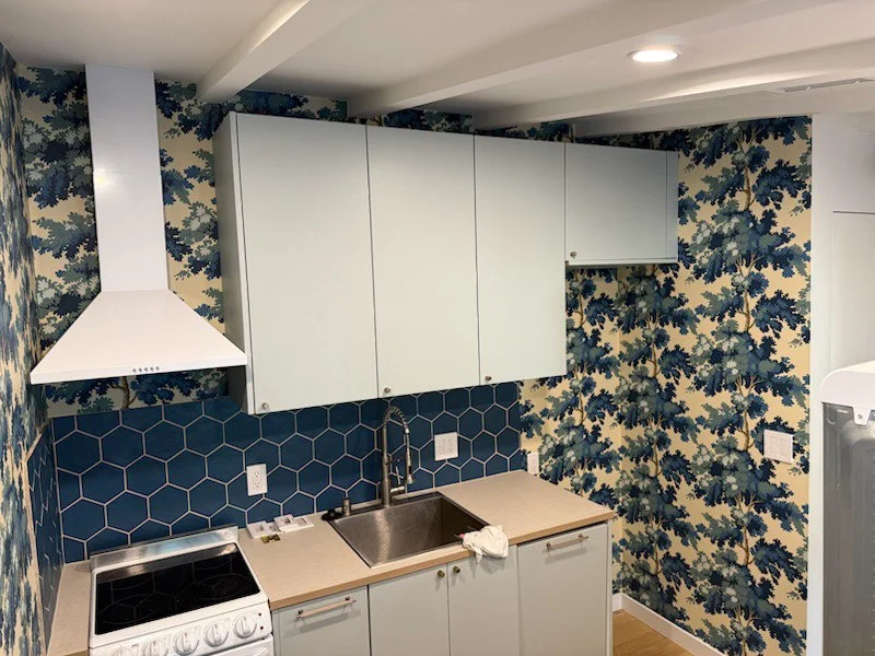 Close-up detail of expert wallpaper craftsmanship in Washington